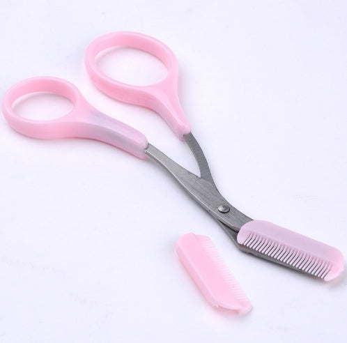 Eyebrow scissor with eyebrow comb