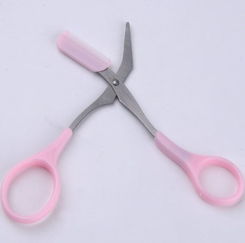 Eyebrow scissor with eyebrow comb