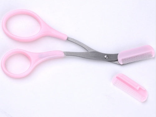 Eyebrow scissor with eyebrow comb