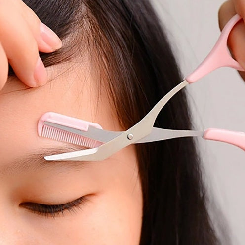 Eyebrow scissor with eyebrow comb
