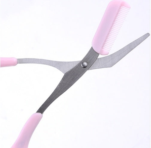 Eyebrow scissor with eyebrow comb